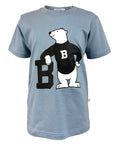 Light blue children's T-shirt with large chest imprint of a cartoon polar bear wearing a black sweater and leaning on a black letter B.