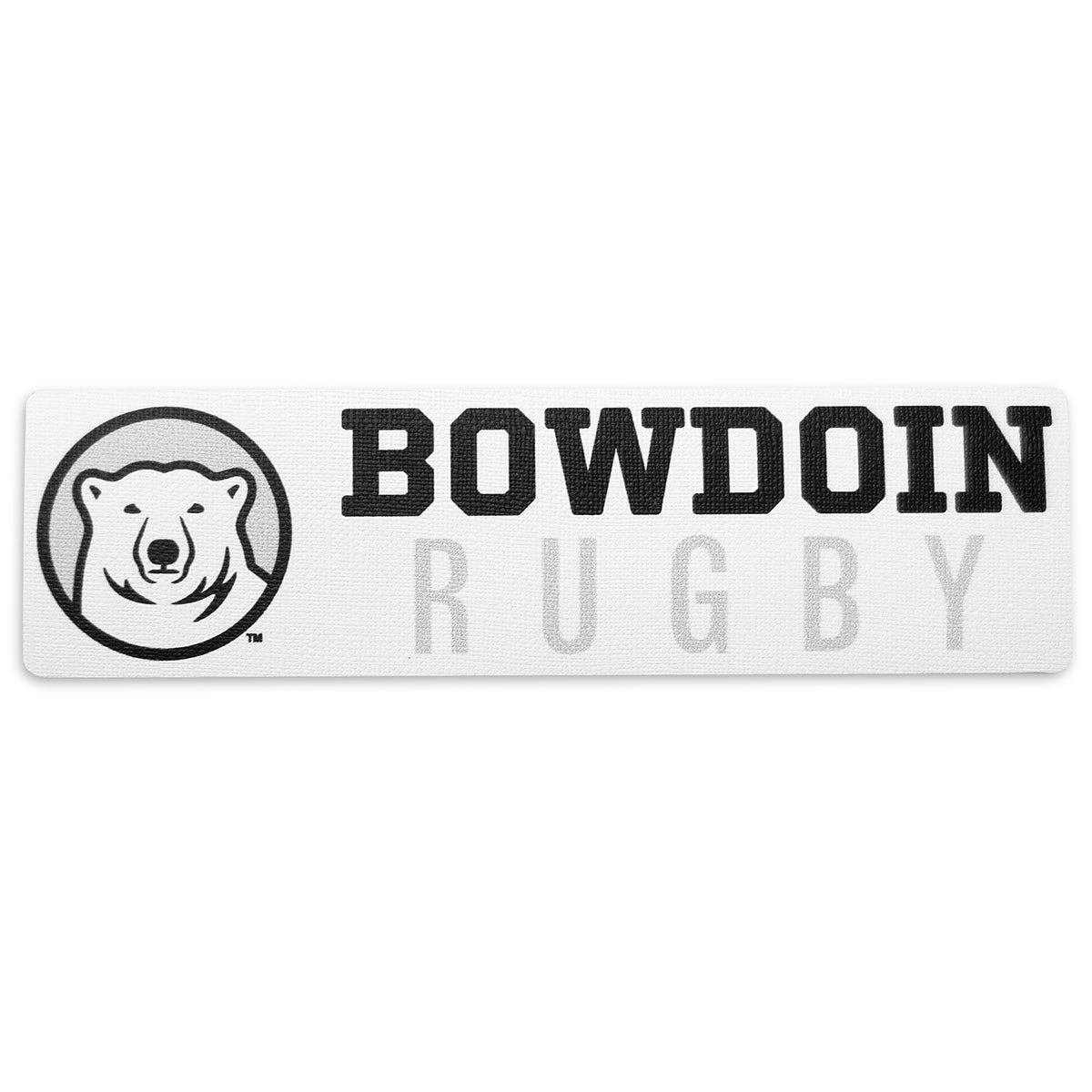 Rectangular white decal with black, white, and grey polar bear medallion next to BOWDOIN in black logotype over RUGBY in grey sans-serif type.