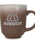 Brown mug with 'Bowdoin' and tree design on a white background
