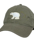 Khaki green cap with a white bear emblem on a white background