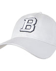 White cap with a black letter 'B' on a white background