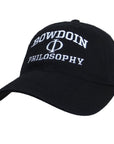 Black ball cap with white embroidery of BOWDOIN arched over Greek letter phi over PHILOSOPHY