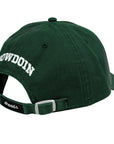 Back of green cap with 'Bowdoin' text on a white background