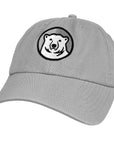 A light gray baseball cap featuring a circular embroidered polar bear logo on the front, set against a plain white background.