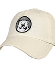 Off-white cap with a black and white bear logo on a white background