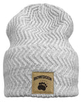 A light gray and white heathered knit beanie hat with a textured chevron pattern and a tan leather patch on the front featuring the 'BOWDOIN' brand name and paw print.