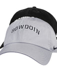 Two Nike Bowdoin baseball caps shown from the front, one in light gray, one in black, displayed on a plain white background.