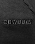 Closeup photo of raised black on black Bowdoin embroidery.