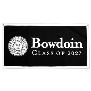 Black felt banner with white border and brass grommets, white felt Bowdoin sun seal on right side, BOWDOIN over CLASS OF 2027 beside the sun.