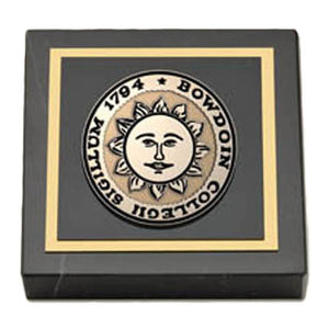 Square black marble paperweight with gold engraved Bowdoin sun seal in the center, framed in a gold square.