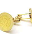 Gold cufflinks with engraved Bowdoin College seal.
