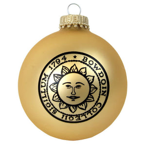 Matte gold glass ball ornament with black Bowdoin sun seal imprint.