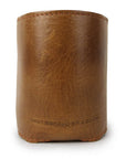 Back of leather can cooler showing embossed Smathers & Branson logo.
