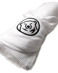 White waffle-knit blanket with embroidered mascot medallion patch. White trim.