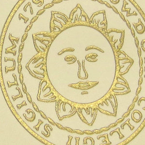 Detail of gold embossed seal on card