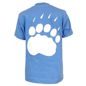 Back view of a children's blue T-shirt with large polar bear paw print imprinted in white on the back.