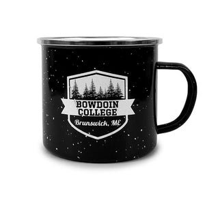Black enamel mug with white speckles and shield imprint of pine trees over a ribbon with BOWDOIN COLLEGE over BRUNSWICK, ME