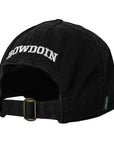Back view of a black baseball cap with the word BOWDOIN embroidered over the back opening, showing the brass buckle size-adjuster.