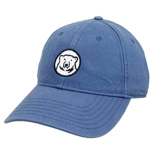 Blue baseball cap with needlepointed polar bear mascot medallion.