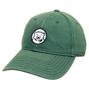 Green baseball cap with needlepointed polar bear mascot medallion.