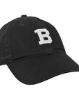 Black ball cap with needlepointed white B on front.