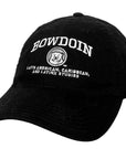 Black ball cap with white embroidered BOWDOIN arched over a mascot medallion over white text Latin American, Caribbean, and Latinx Studies