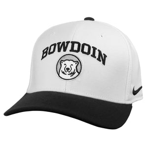White flex-fit hat with black brim. BOWDOIN in black arched over mascot medallion embroidery.