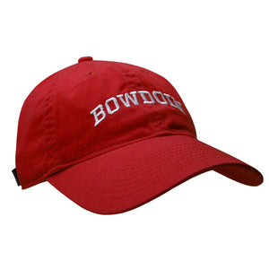 Women's red baseball cap with white arched BOWDOIN embroidery.