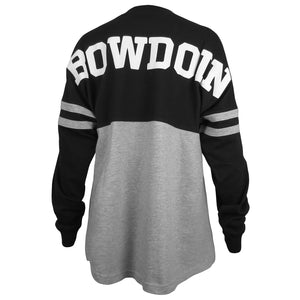 Women's long sleeved shirt with black top half and sleeves, and grey bottom. Grey stripes on sleeves, and large BOWDOIN print in white across shoulders.