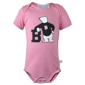 Pastel pink diaper shirt with large chest imprint of cartoon polar bear wearing a black B sweater, leaning on a large black B.