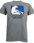 Gray short-sleeved T-shirt with picture of a polar bear sitting against the side of a rectangle with a blue background. Text beneath reads THE PEARY-MACMILLAN ARCTIC MUSEUM, BOWDOIN COLLEGE, BRUNSWICK, MAINE