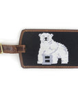 Brown leather luggage tag with brass buckle and needlepointed Bowdoin polar bear mascot backing.