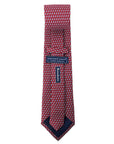 Back view of a red silk tie with an all-over imprint of the Hyde Plaza polar bear showing Vineyard Vines label and Bowdoin wordmark.