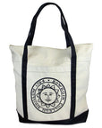 Natural canvas tote with black handles and bottom. Bowdoin sun seal imprint on front pocket.
