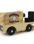 Wooden ice resurfacer with imprint of BOWDOIN arched over a mascot medallion over POLAR BEARS.
