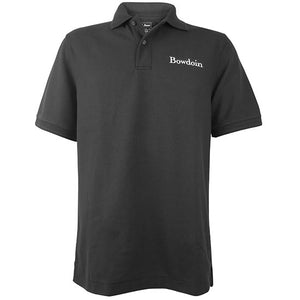 Black polo shirt with white embroidered Bowdoin wordmark on left chest.