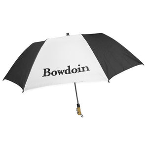Umbrella with alternating black and white panels and Bowdoin wordmark imprint.