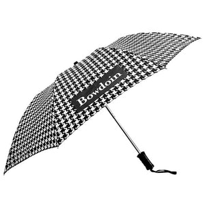 Black and white houndstooth umbrella with white BOWDOIN imprint inside a black rectangle.
