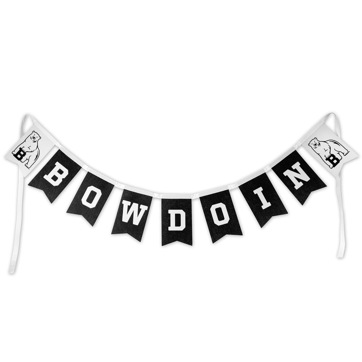 A black and white banner garland spelling out 'BOWDOIN' in bold white letters on black flags, with white ties and small white polar bear mascot flags on the ends.