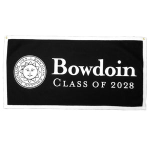 Black banner with white border. White sun seal on left with white BOWDOIN over CLASS OF 2028 on right.