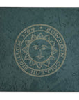 Green slate coaster with engraved Bowdoin College seal.