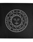 Black slate coaster with engraved Bowdoin College seal.