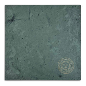 Green slate square trivet with Bowdoin College seal etched in lower left corner.