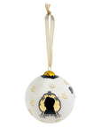 View of ornament with silhouette design of Nathaniel Hawthorne on a white background