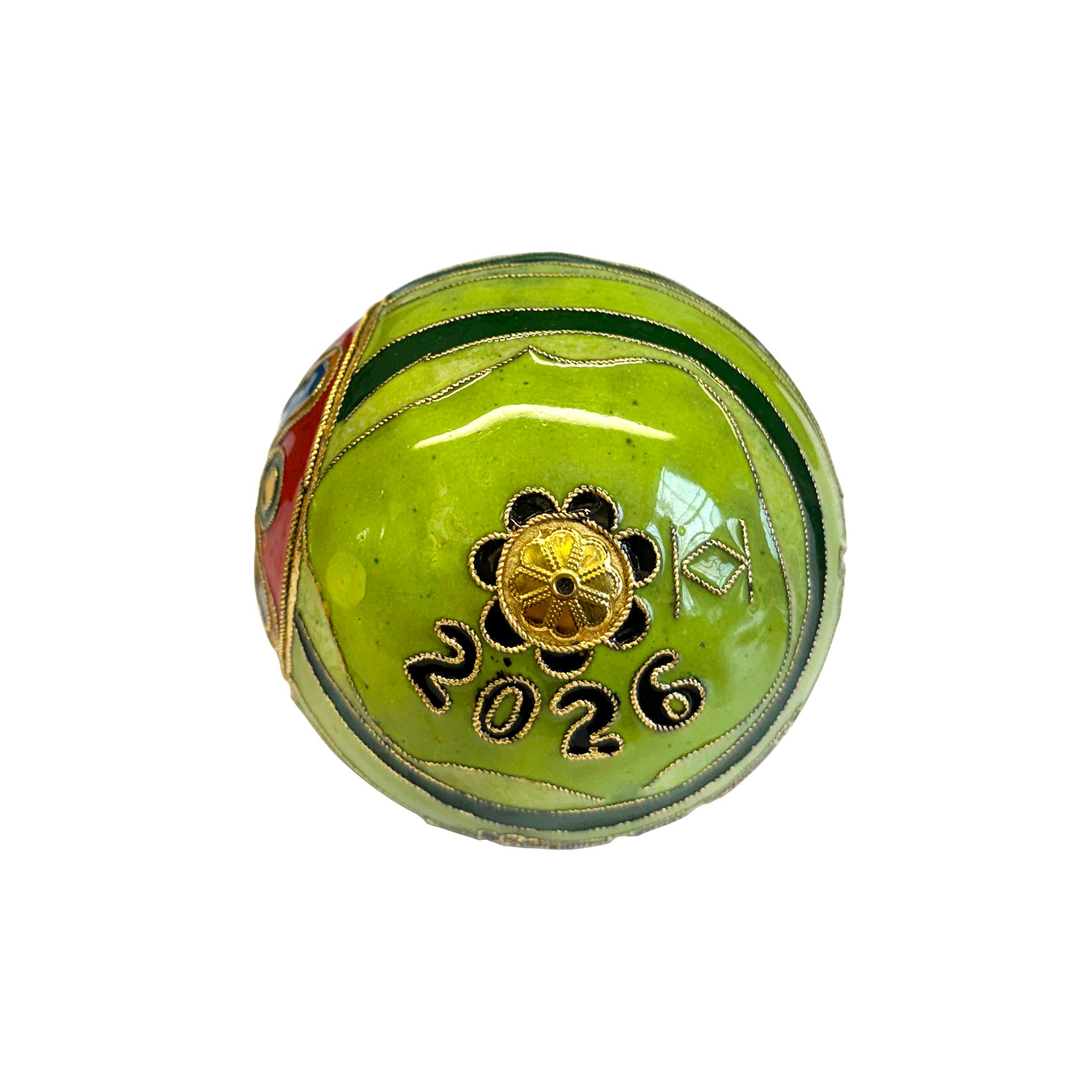 Bottom view of decorative ball ornament with '2026' and floral design on a white background