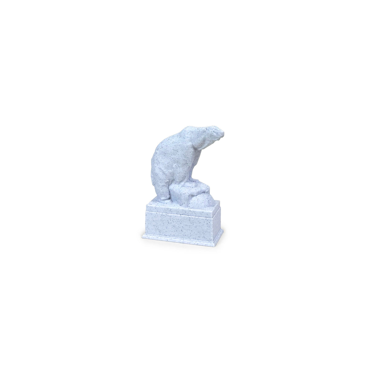 A small pale blue-gray stone-look plastic sculpture of a polar bear standing on a rock, mounted on a rectangular pedestal base, shown against a plain white background.