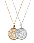 Gold and silver sunburst pendants