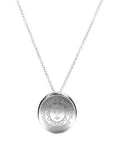 Silver necklace with slightly concave silver pendant engraved with the Bowdoin College seal.