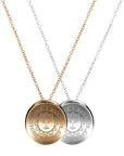Organic seal necklace in gold and silver