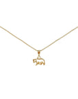 Gold plated polar bear pendant on gold plated necklace chain.